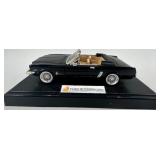 2 Diecast Model Cars Including 1958 Pontiac Bonneville and Convertible