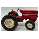 Set of 2 Die-Cast Toy Tractors - International and John Deere 3010