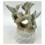 Vintage Books with a Humming Bird Music Box