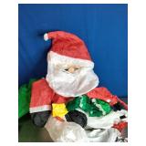National Tree Company 6 ft. Inflatable Santa Riding Polar Bear.