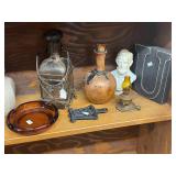 Collection of Vintage Decor Items Including Bust, Bottles, Iron Trivets and Lanterns