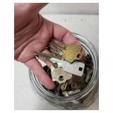 Glass Jar Filled with Mixed Vintage Metal Keys