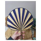 Assorted Woven Basketry Decor Items, Hand Fan, and Floral Arrangement