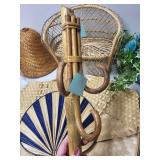 Assorted Woven Basketry Decor Items, Hand Fan, and Floral Arrangement