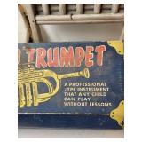 Vintage Musical Lot: Golden Trumpet Toy, Tambourine, and Washboard