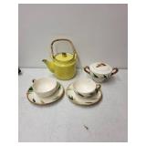 Vintage Tea Set with Yellow Teapot, Bamboo Handle, Cups, Saucers, and Sugar Bowl