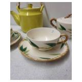 Vintage Tea Set with Yellow Teapot, Bamboo Handle, Cups, Saucers, and Sugar Bowl