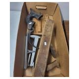 Collection of Antique Tools and Equipment Including Wood Plane, Cast Iron Seal, Egg Grading Scale, and Casting Mold