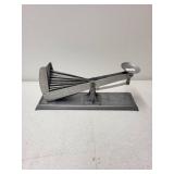 Collection of Antique Tools and Equipment Including Wood Plane, Cast Iron Seal, Egg Grading Scale, and Casting Mold