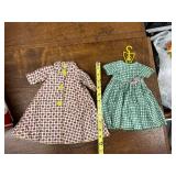 Vintage Red Metal Storage Trunk with Collection of Doll Clothes and Accessories