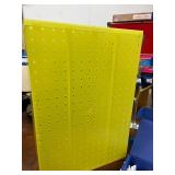 Yellow Pegboard Display with Assorted Peg Hooks
