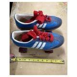 Vintage Blue Roller Skates with Red Laces