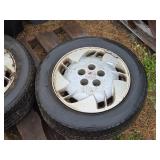 Lot of (2) Vintage Pontiac P215/60R16 Tire with 16" Rim