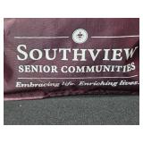 Household Organizer Lot with Longaberger Basket, Totes, Table Runners, and Storage Bins