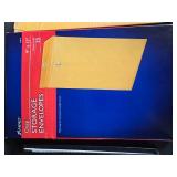 Assorted Office Supplies Lot Including Paper, Envelopes, Rulers, and Binder - contents unverified