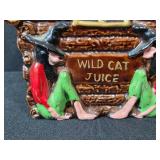 Vintage Collectibles Lot with Glass Decanter, Wild Cat Juice Jug, Ceramic Pony, Miniature Mugs, Spoons, and Kennedy Shakers