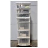 Plastic Storage Drawer Tower Filled with Assorted Tools and Hardware