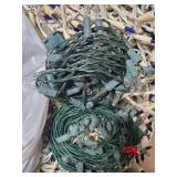 Collection of Holiday String Lights and Artificial Evergreen Garland