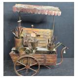 Mixed Household Lot with Metal Flower Cart, Plastic Plates, Drop Cloth, Bulb, and Storage Items