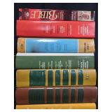 Large Collection of Hardcover Books and VHS Tapes