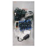 Collection of Christmas Lights and Blue Ornament Balls in Storage Bin