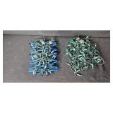 Collection of Christmas Lights and Blue Ornament Balls in Storage Bin