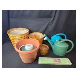Assorted Garden Watering Cans, Flower Pots, Baskets, and Garden Stand