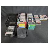 Vintage Cassette Recorder, Assorted Cassette Tapes, CDs, Blank Tapes, and DVDs Collection