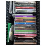 Vintage Cassette Recorder, Assorted Cassette Tapes, CDs, Blank Tapes, and DVDs Collection