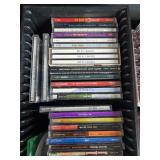 Vintage Cassette Recorder, Assorted Cassette Tapes, CDs, Blank Tapes, and DVDs Collection