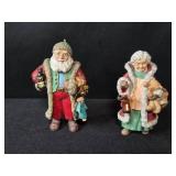 Holiday Decor and Party Supplies Lot with Stockings, Ornaments, Napkins, and Tablecovers