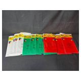 Holiday Decor and Party Supplies Lot with Stockings, Ornaments, Napkins, and Tablecovers