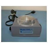 (1) Atlas Soundolier RWL-1 Magnetic Rack / Work Light and (1) ADEMCO 710 Blue Unistrobe Warning Light