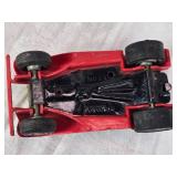 Toy vehicles including a Tonka vintage car, a Chevrolet police car, and a J.T. Wilson truck