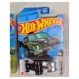 Hot Wheels Assorted Die-Cast Cars featuring different models and themes such as Netflix