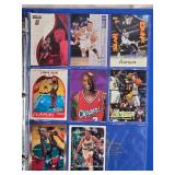Binder of Sports Cards Featuring Basketball and Baseball Players Including Michael Jordan and Ken Griffey Jr. Various cards from different sets