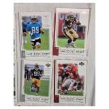 Large Lot of 2001 Upper Deck Top Tier Football Cards Featuring Key Players Including Peyton Manning, Brett Favre, and Kurt Warner