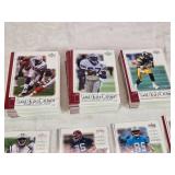 Large Lot of 2001 Upper Deck Top Tier Football Cards Featuring Key Players Including Peyton Manning, Brett Favre, and Kurt Warner