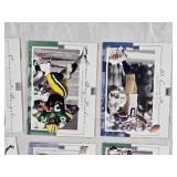 Lot of Football Cards Featuring Brett Favre, Emmitt Smith, Walter Payton, and Howie Long