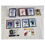 Large Lot of Fleer 2002 Football Cards Featuring Players Like Daunte Culpepper and Michael Vick, 2002 Fleer Showcase