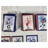 Large Lot of Fleer 2002 Football Cards Featuring Players Like Daunte Culpepper and Michael Vick, 2002 Fleer Showcase