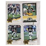 Large Lot of 2002 Fleer Football Cards Featuring Daunte Culpepper, Jerry Rice, Brett Favre, and Randy Moss