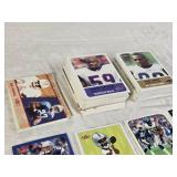 Large Lot of 2002 Fleer Football Cards Featuring Daunte Culpepper, Jerry Rice, Brett Favre, and Randy Moss