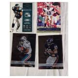 Early 2000s Playoff Prestige Football Cards Featuring Jerry Rice, Kurt Warner, Emmitt Smith, and Donovan McNabb