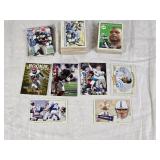 Large Lot of 1999-2001 Football Cards Featuring Players Like Peyton Manning, Marvin Harrison, and Troy Aikman. Includes Rookie Sensations, Unsung Heroes, and Fleer Tradition.