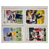 Lot of 4 Football Cards Featuring Brett Favre, Emmitt Smith, Wayne Chrebet, and Jevon Kearse