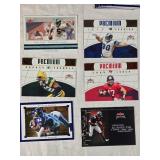 Lot of 10 Football Cards Featuring Tom Brady, Brett Favre, Kurt Warner, and Jerome Bettis