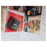 Variety of vinyl records featuring notable country and pop artists such as Sam & Kirk McGee, Del Shannon, Carl Smith, Mel Tillis, Marty Robbins, The Carpenters, Johnny Duncan, Mickey Gilley, Charlie R