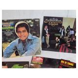 Collection of Vinyl Records Featuring Charley Pride, Frizzel and West and Others