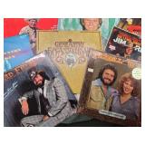 Collection of Vinyl Records Featuring Charley Pride, Frizzel and West and Others